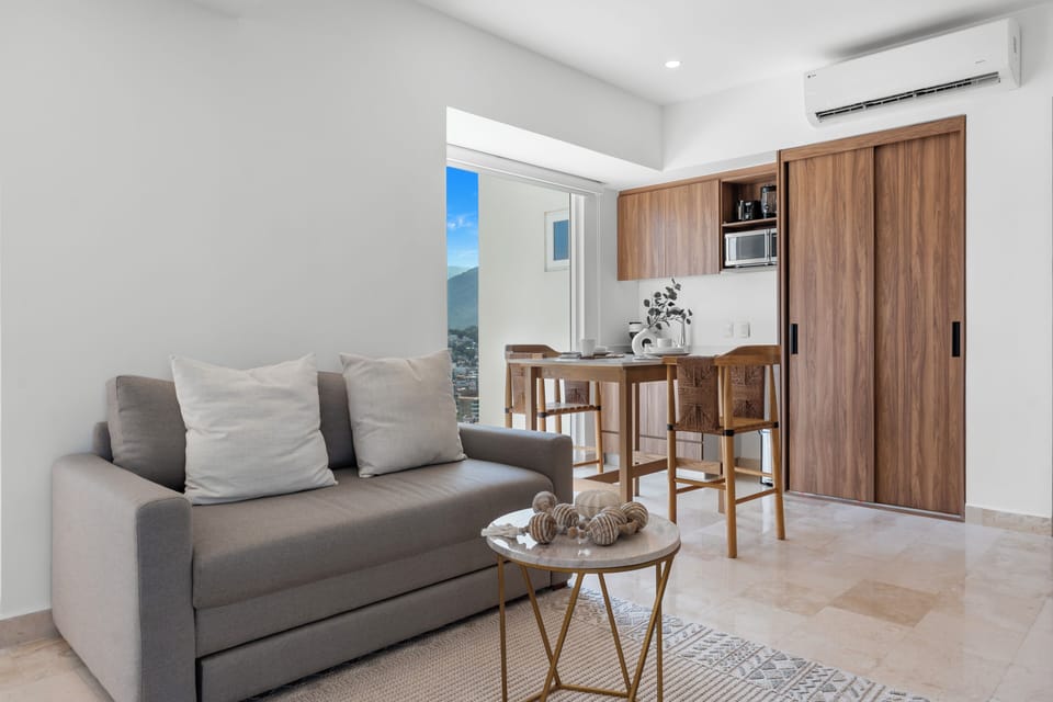 Panoramic Studio, Balcony, Partial Sea View | Living area