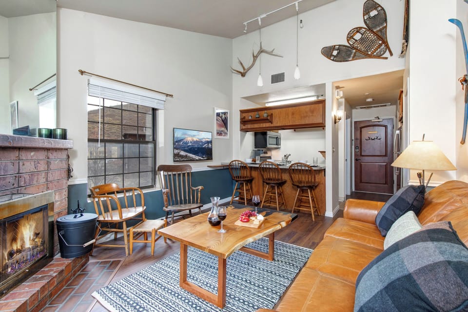 Cozy up by your crackling fireplace in this warm mountain retreat.