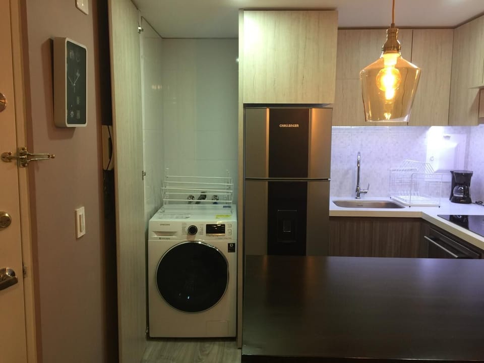 Dedicated laundry area with washing machine