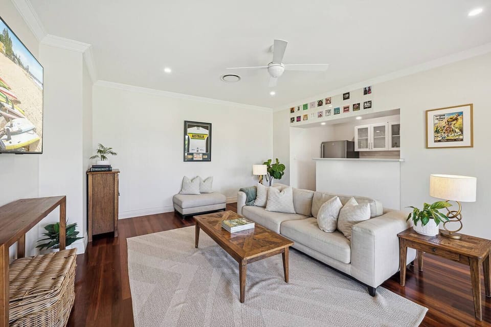 This relaxed living space provides an easy escape from the main gathering areas—perfect for movie nights, afternoon downtime, or kids’ entertainment.