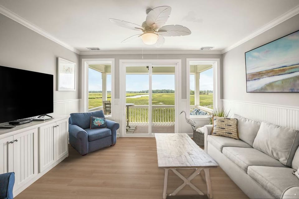 Living Room with that view!!  All new LVP flooring through entire home