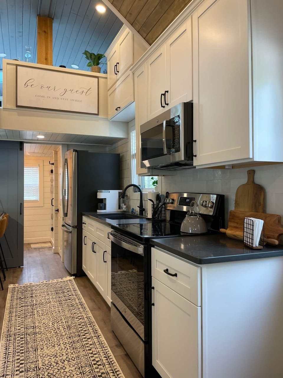 The full kitchen includes a full-sized refrigerator, microwave, electric range, keurig coffee maker, and sink. In the cabinets & drawers, you will find that you are fully equipped with anything you might need  during your stay! 