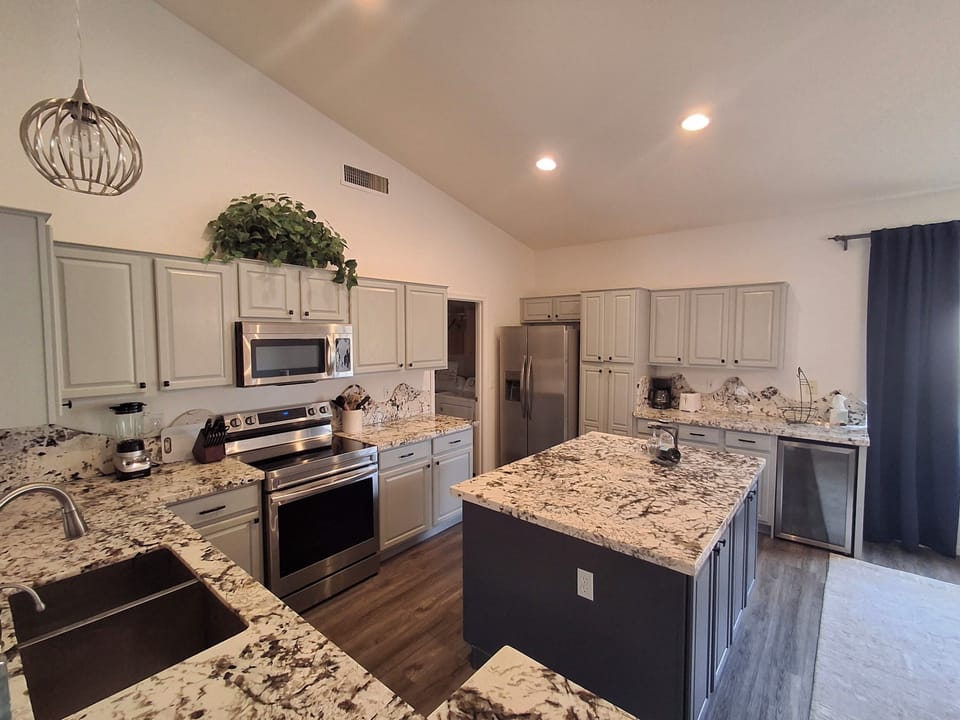 Kitchen: A well stocked space for cooking and prepping meals. 