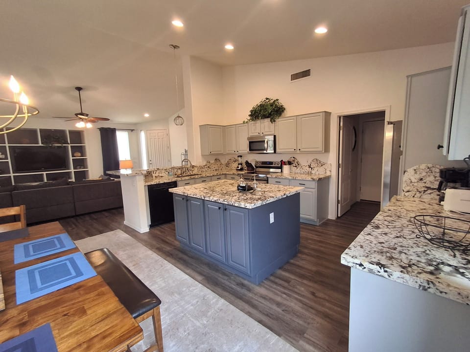 Kitchen: Open to the livingroom so you can be part of your group & watch TV too.