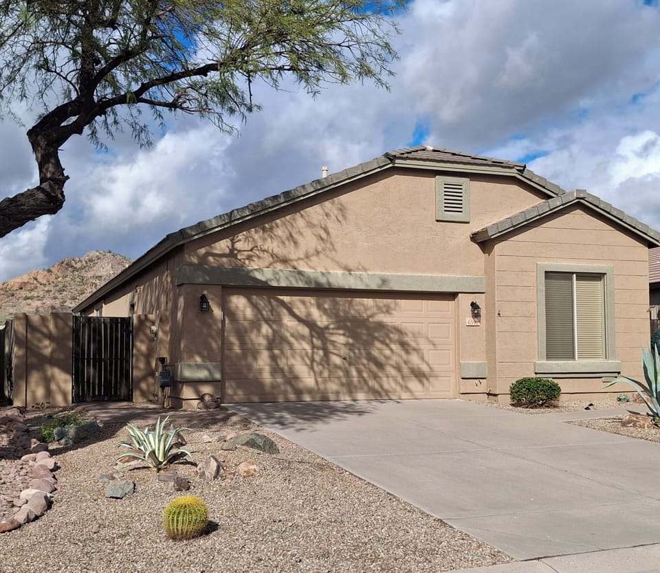 Access to 2 car garage.  Afternoon shaded driveway.  Lit walkway to front door.