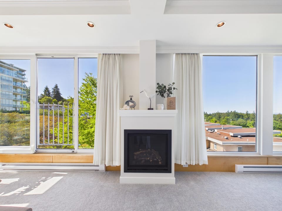 Unwind on crisp Pacific evenings by the cozy gas fireplace centered along the living area wall.