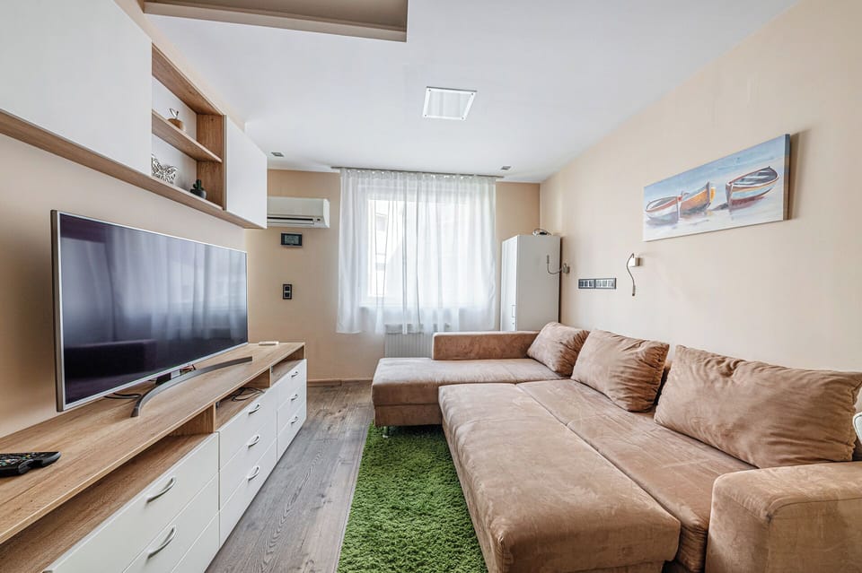 Apartment, 2 Bedrooms | Living area | Flat-screen TV