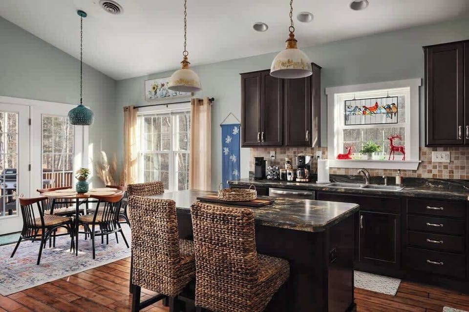 Natural light pours in while you're prepping meals with a view of the woods.