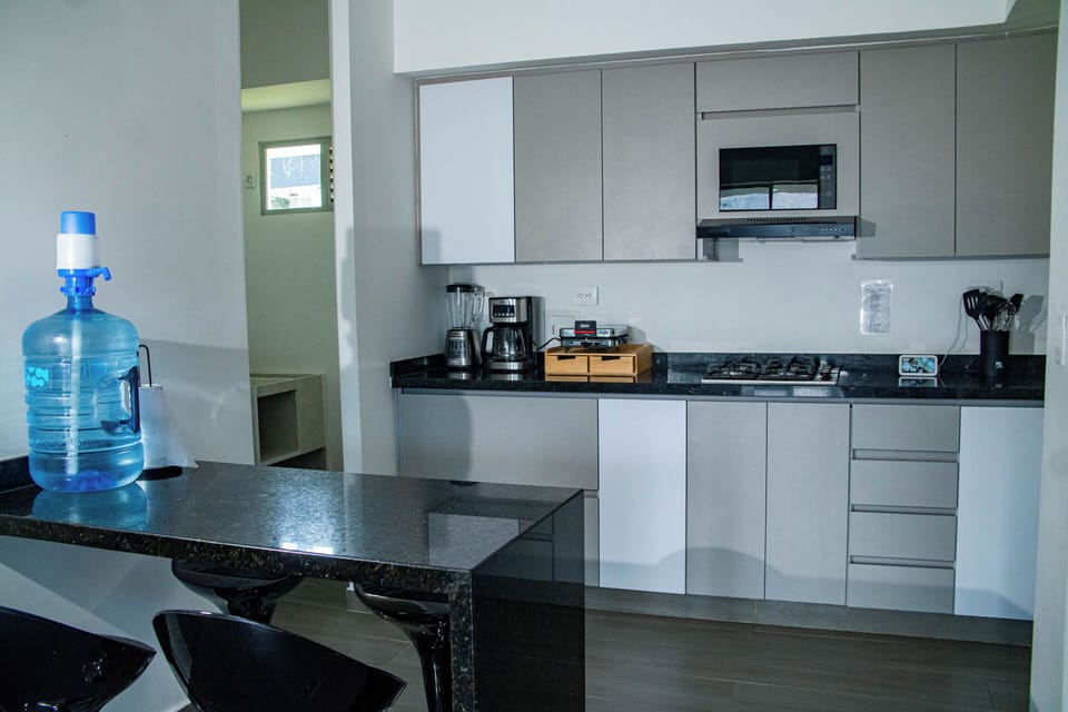 Family Suite, Balcony, Mountain View | Private kitchen