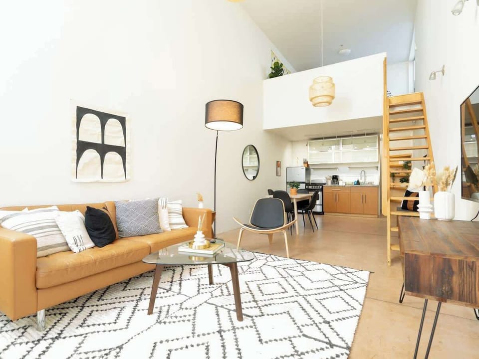 Modern design meets comfort in our inviting living room—your perfect retreat!
