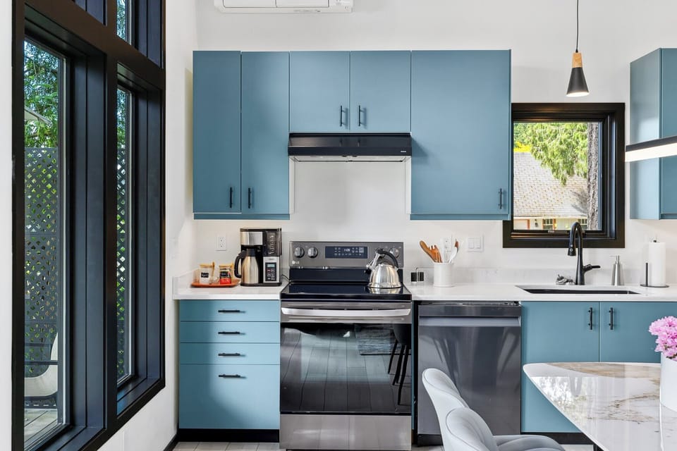 Blue cabinetry matches our coastal palette