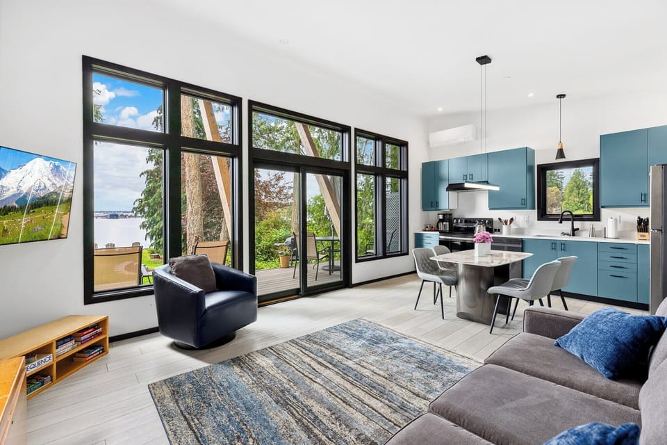 Cozy seating in the open concept living space with dining & kitchen
