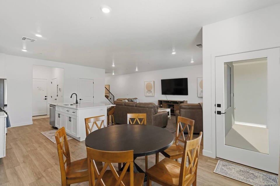 Open dining area connected to the kitchen and living space.