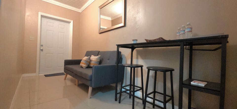 The cozy living area features a convertable sofa bed for an extra guest
Plus a dedicated dining space  ideal for enjoying a homemade breakfast or a Bahamian meal after a long day in the sun. 