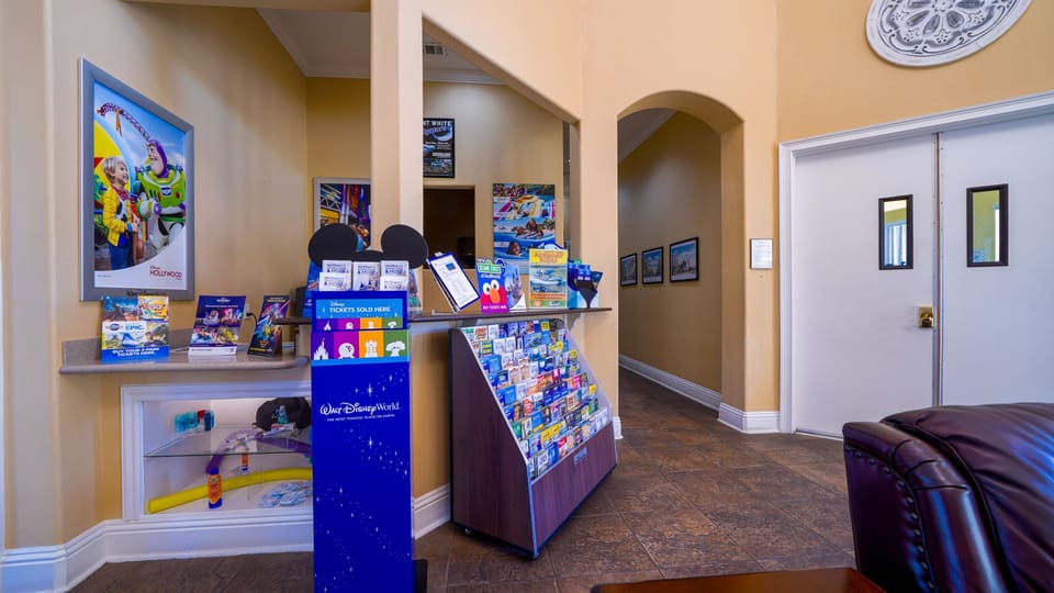 Entertainment room featuring a full-size pool table and arcade machine.