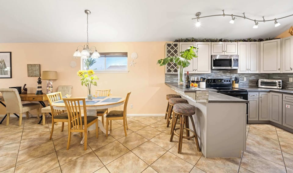 Dining & Kitchen — Bar Stools, Round Table & Coastal Accents