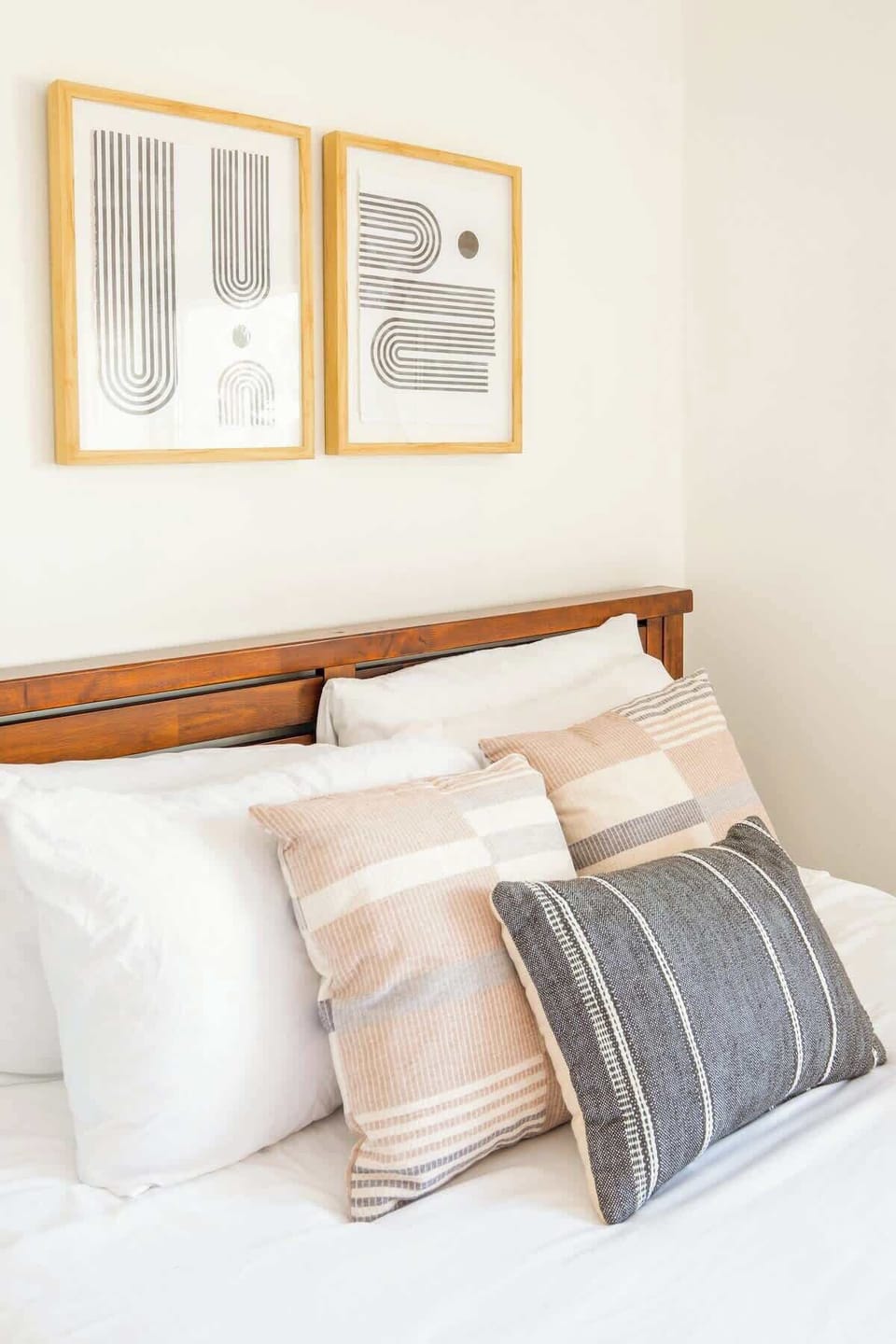 The bed comes topped in quality linen and soft pillows