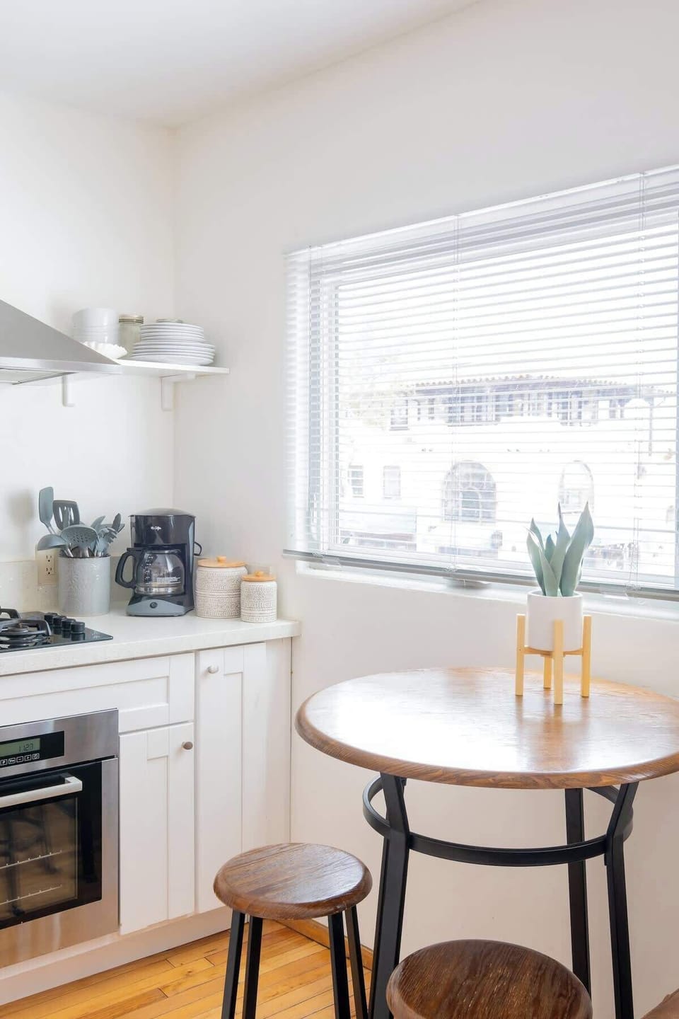 Sit together in the sunshine at the stylish dining table 
