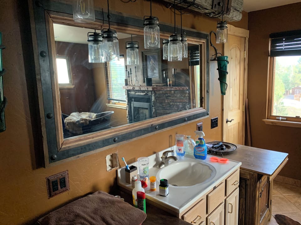 Mirror was replaced.  Vanity is being custom made and not completed yet.