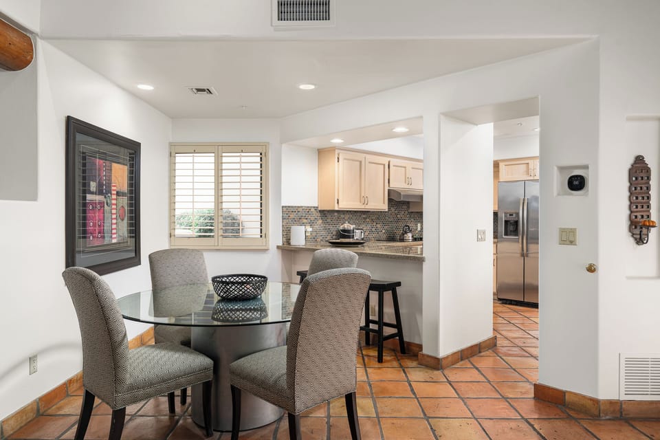 Cozy dining space with natural light and easy access to the kitchen.