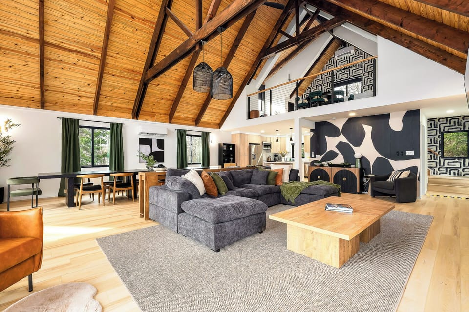 Stunning vaulted great room with loft, designer style, and spacious seating