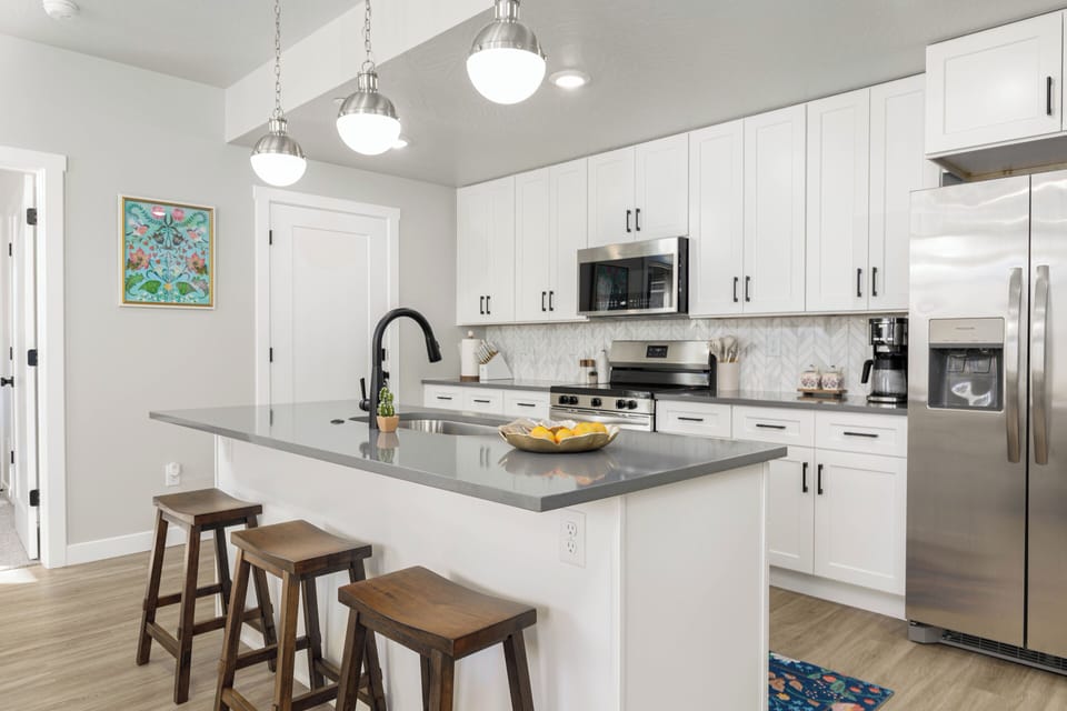 Kitchen with island that seats 3 