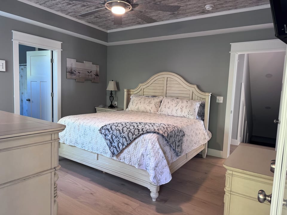 Master bedroom with king bed on the main floor