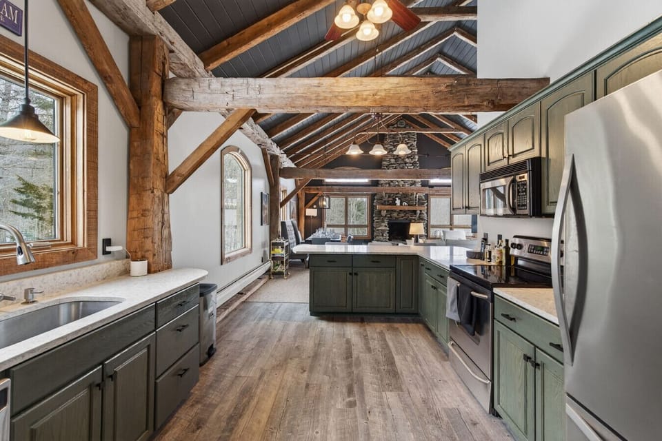 Fully stocked kitchen with pots, pans, baking dishes, mixing bowls, blender, toaster, cooking tools and all dishware/glassware/cutlery for all you could need to host a great group dinner.