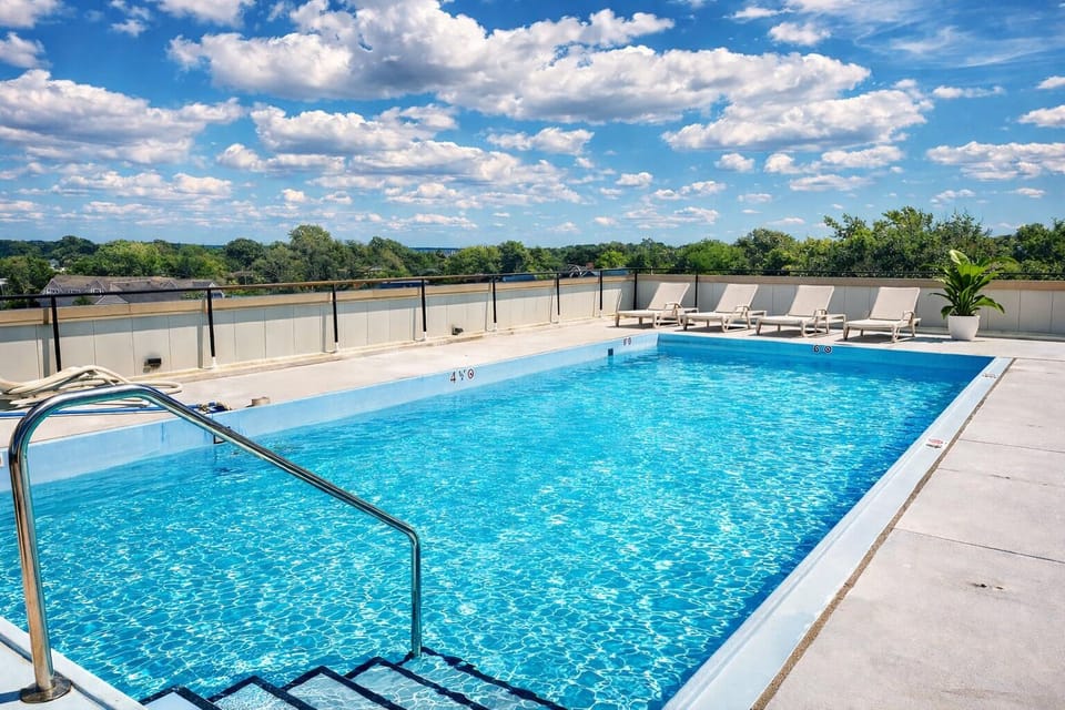 Shared rooftop pool with stunning views — a favorite spot to relax and soak up the sunshine