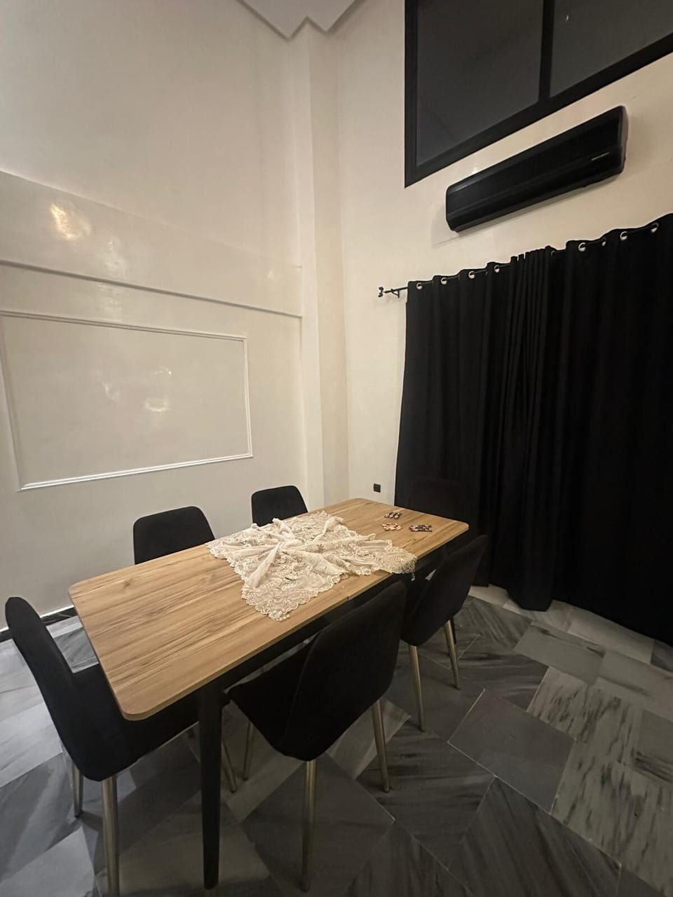 Deluxe Duplex | Living area | Flat-screen TV