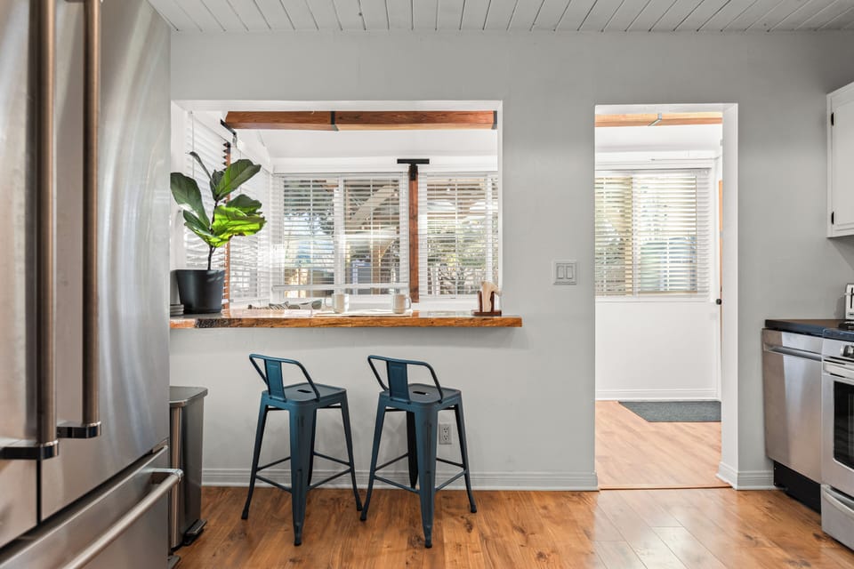 Breakfast bar with seating for two.