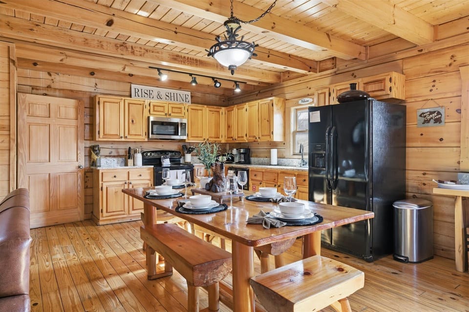Open flow from kitchen to dining makes entertaining effortless.