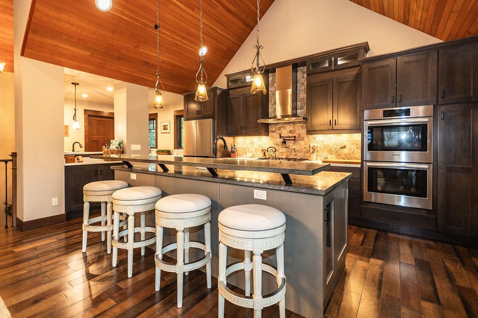 Chef’s kitchen with a generous island—ideal for cooking, cocktails, and connection.