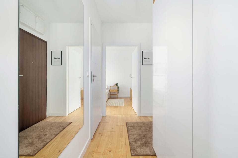 The living room's modern furnishings create a welcoming atmosphere.