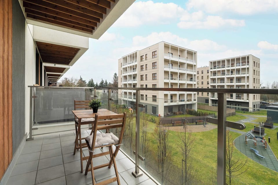 The balcony provides a perfect spot for enjoying the fresh air.