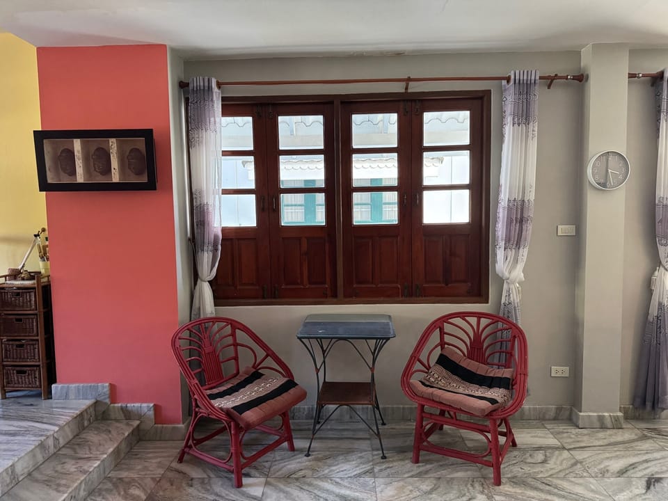 extra seating between dining and living rooms/puzzle/reading table