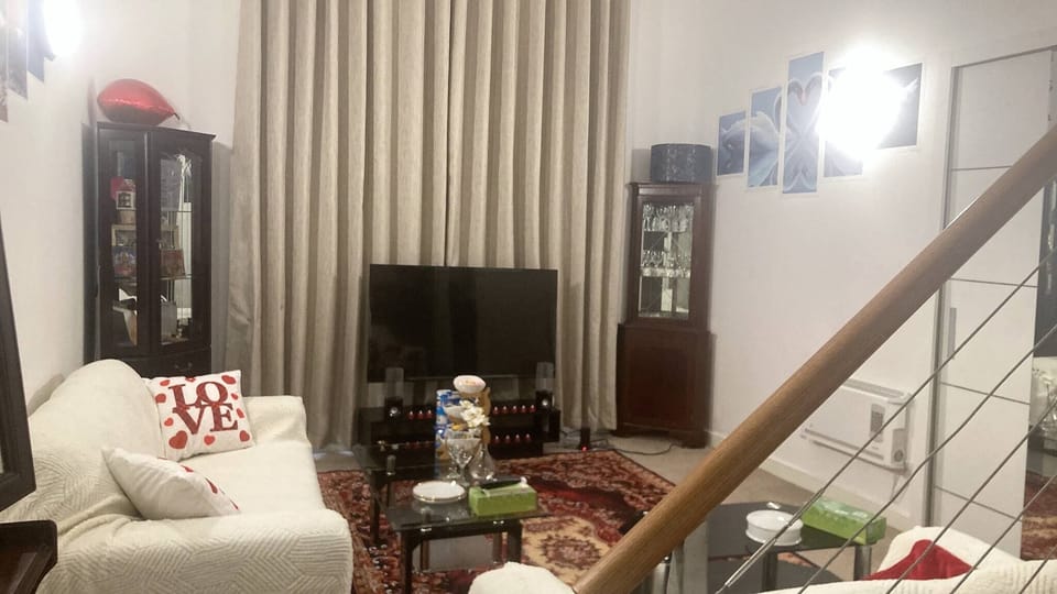 Apartment, 2 Bedrooms | Living room | Books