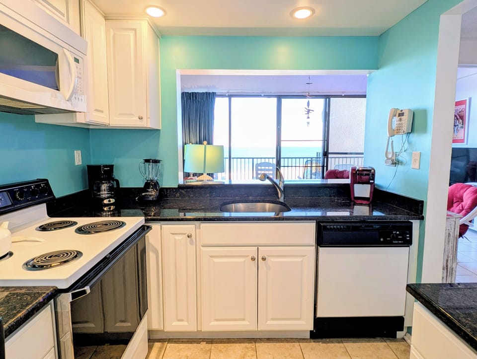 908 Dover Sea Colony East Ocean View - Stunning panoramic view of the wide, guarded private beach and Atlantic horizon from the elevated balcony of 908 Dover.