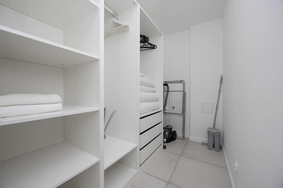 Spacious wardrobe and storage area.