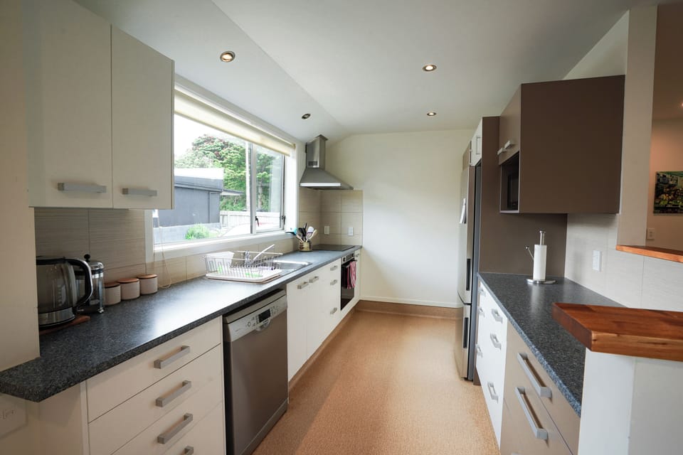 Spacious kitchen with full amenities.
