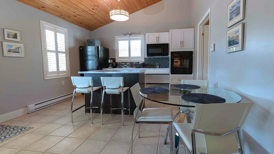 Basic Cottage, Non Smoking, Patio | Living area | Flat-screen TV