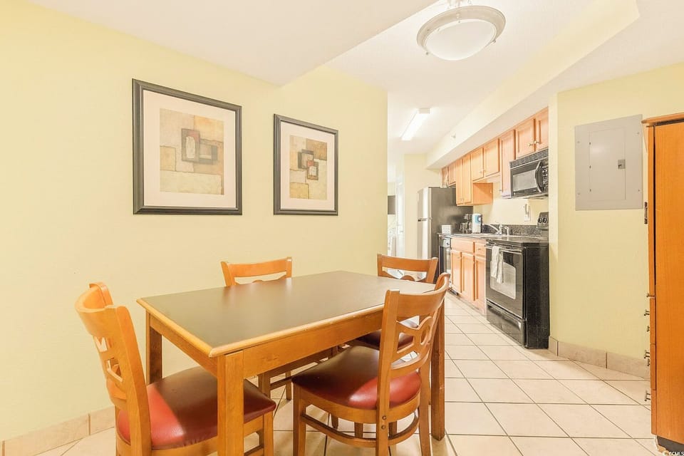 Dining area with four seats.