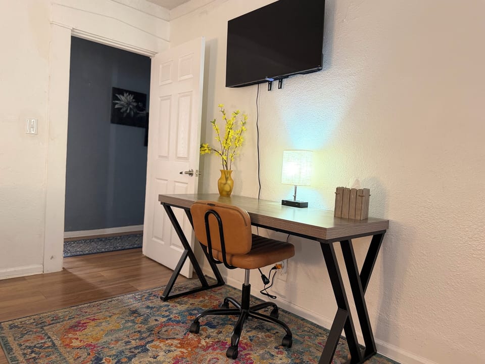 A dedicated workspace in the bedroom provides a quiet and comfortable spot to w
