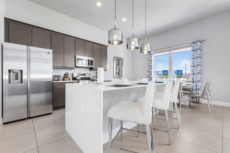 A stylish kitchen bar ideal for quick bites and relaxed hangs