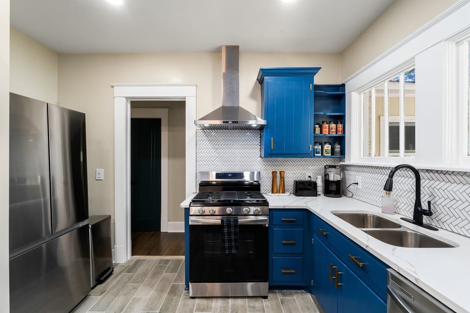 Spacious Chef's Kitchen. Fully stocked with everything you need to create fabulous meals. Enjoy breakfast on the counter bar, watch your favorite cooking show on the 50" Smart TV, also includes full size washer/dryer.