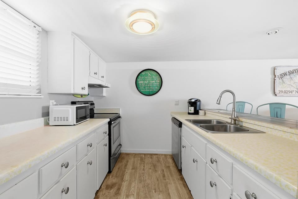 Condo, Multiple Beds (Coronado Towers 104) | Private kitchen | Oven, toaster