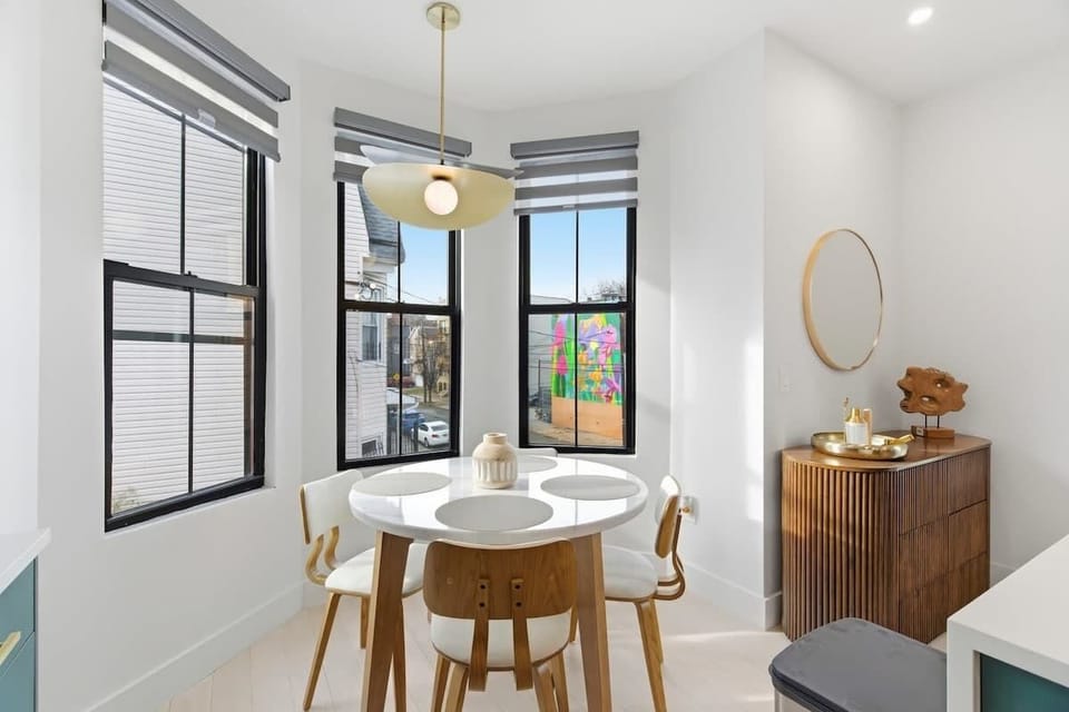 Inviting dining space featuring large windows and stunning views, ideal for relaxed breakfasts or memorable dinners.