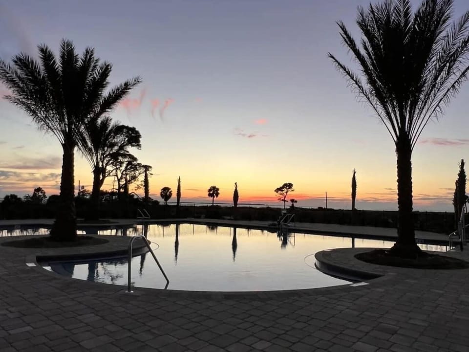 Beautiful pool area perfect for lounging and cooling off.