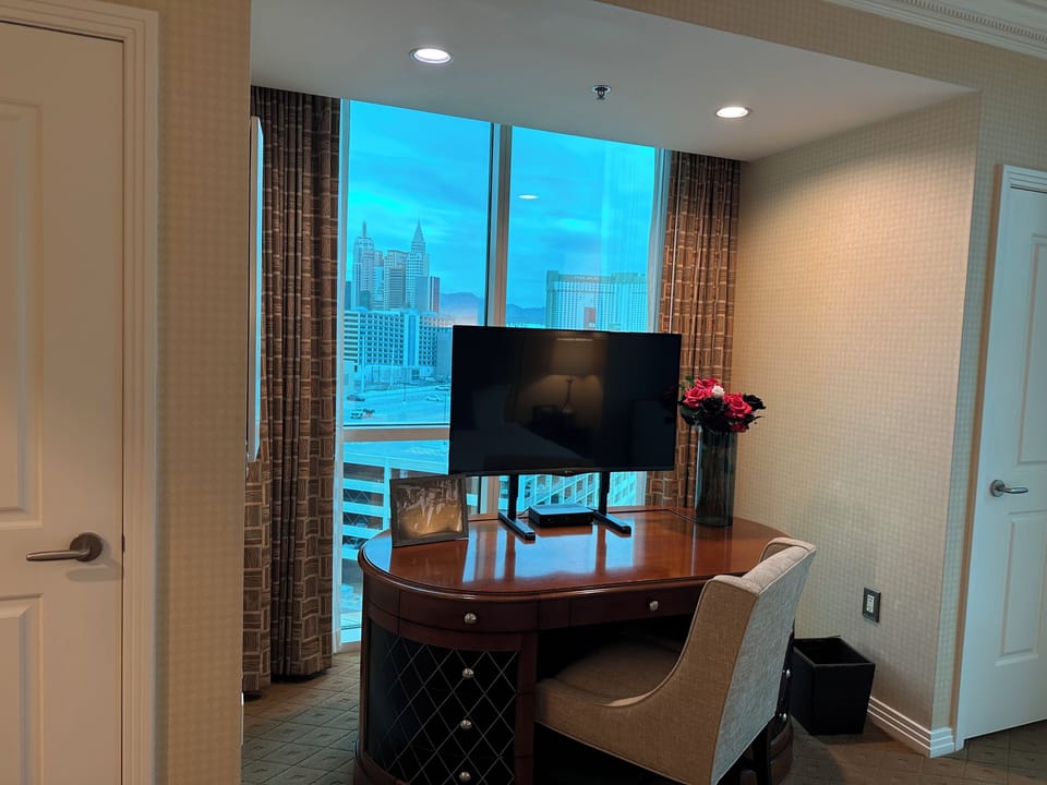 Desk area with view of Excalibur castle and MGM