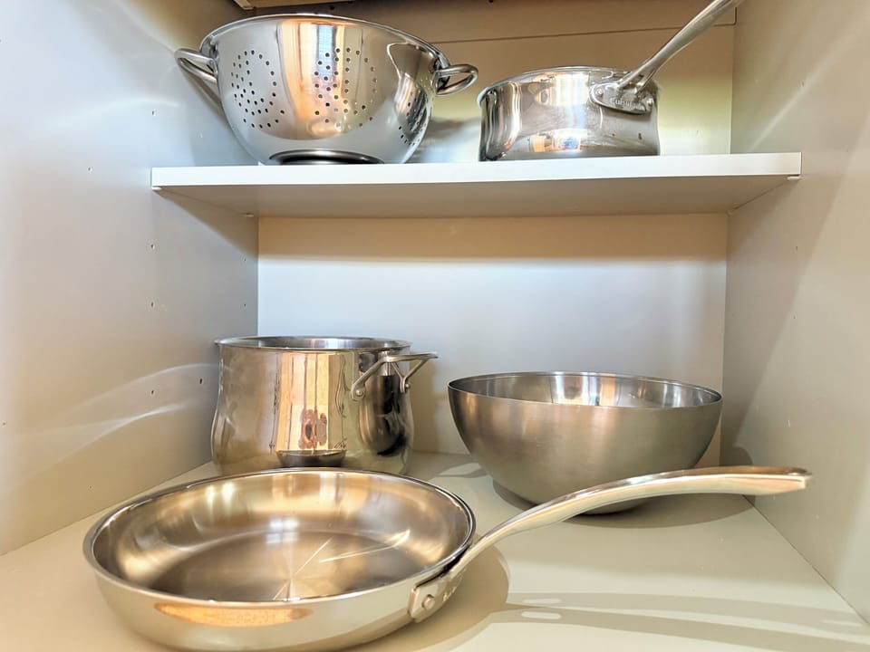 All stainless steel + 1 frequently replaced non-stick pans for your morning eggs